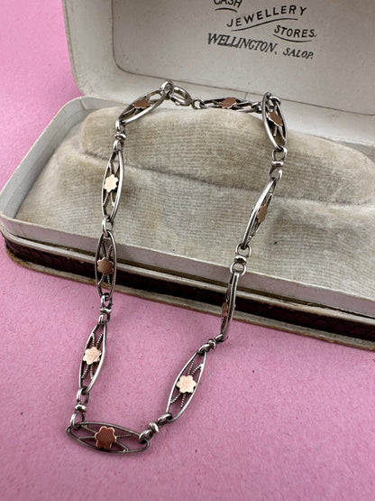 French 800 silver filigree bracelet with gold plated details.