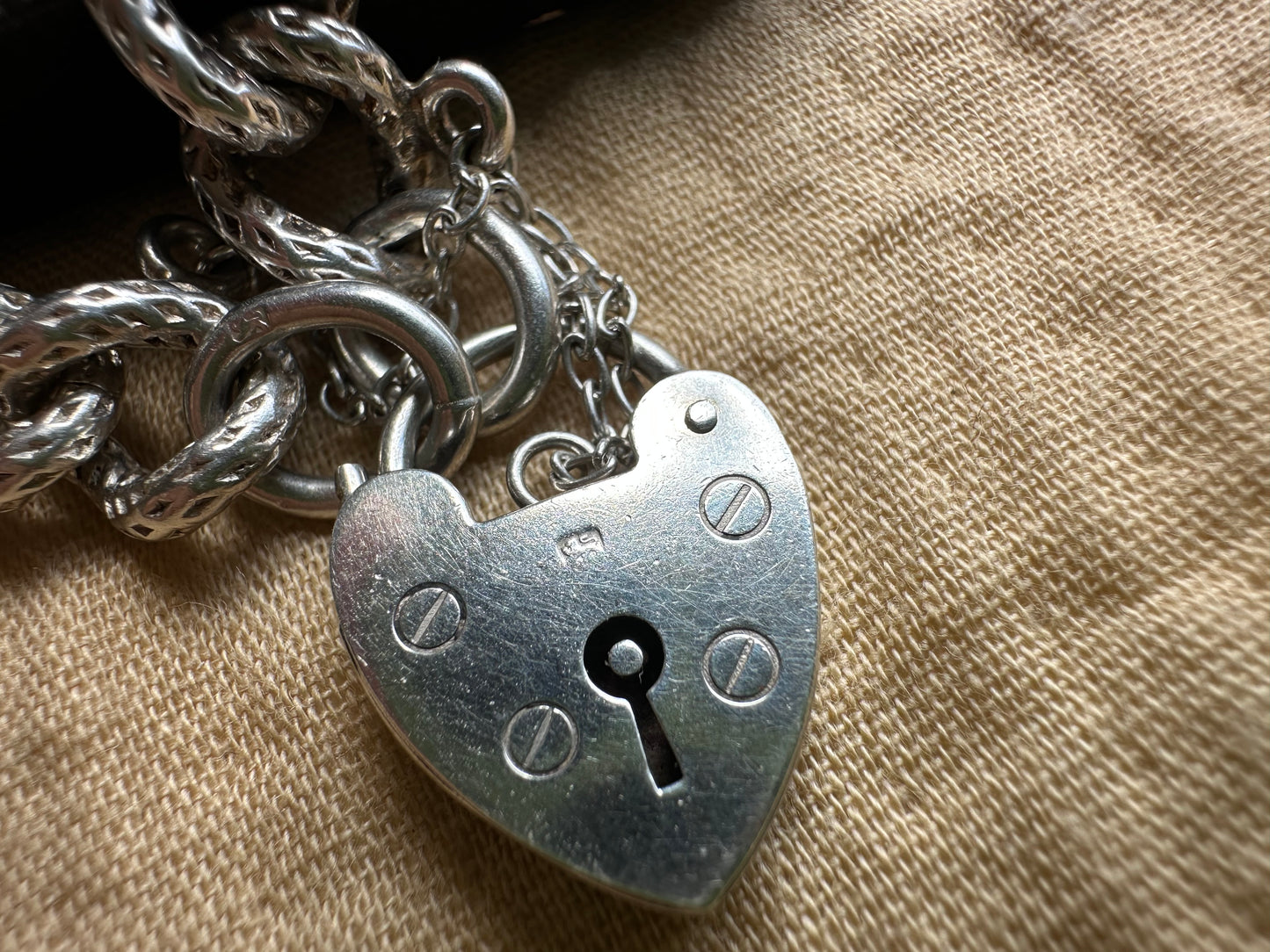 Sterling silver textured chunky curb bracelet with heart padlock