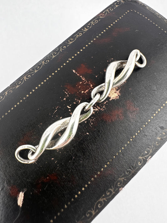 Sterling Silver twist extender- no clasps