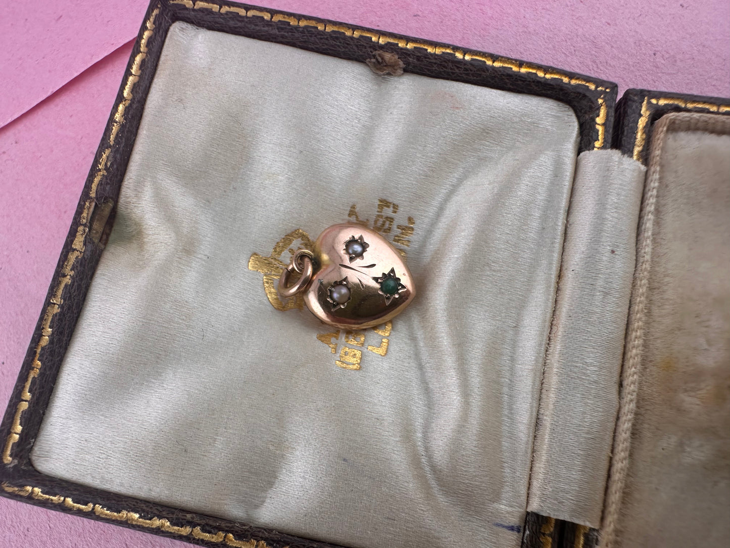 Antique 9ct rose gold heart with flush set pearls and turquoise.