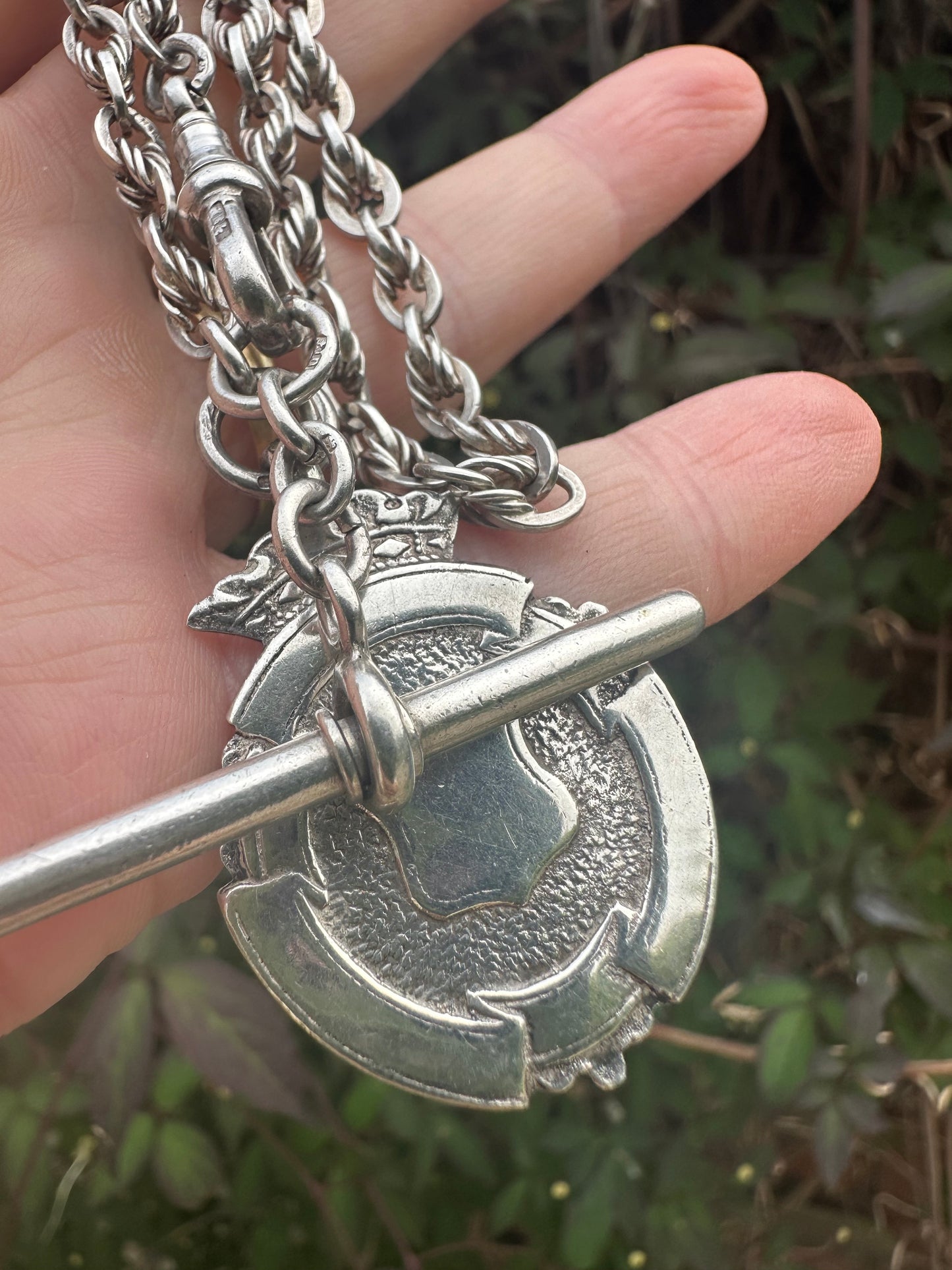 Sterling Silver Lovers Knot Albert chain, with T-bar, dogclip and shield fob.