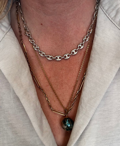 Sterling Silver Mariner chain with concealed clasp.
