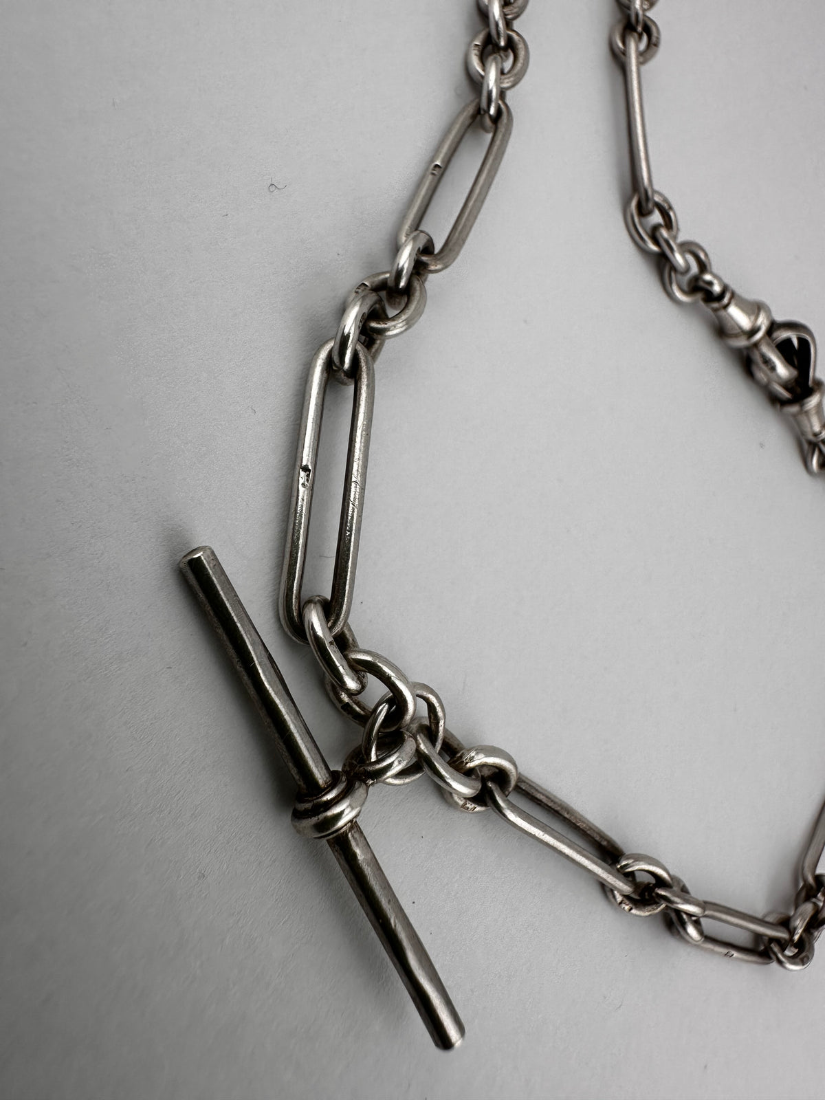Antique Sterling Silver Trombone Albert chain with double dog clips and fixed T-bar