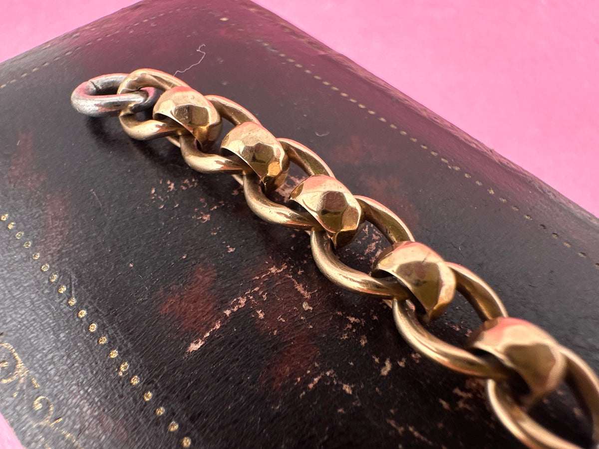 Mix metal extender. 9ct Yellow gold roller ball with sterling silver dog clip.