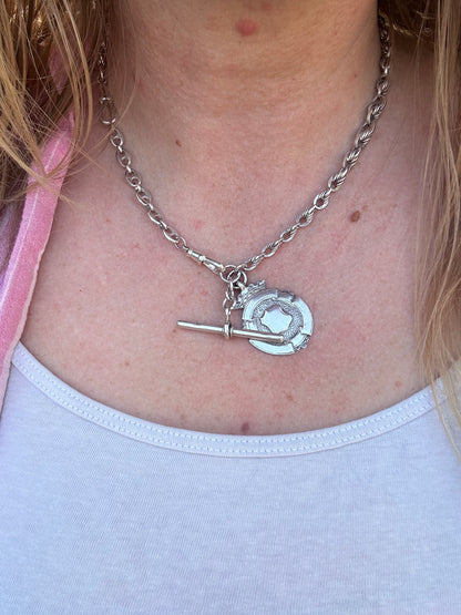 Sterling Silver Lovers Knot Albert chain, with T-bar, dogclip and shield fob.