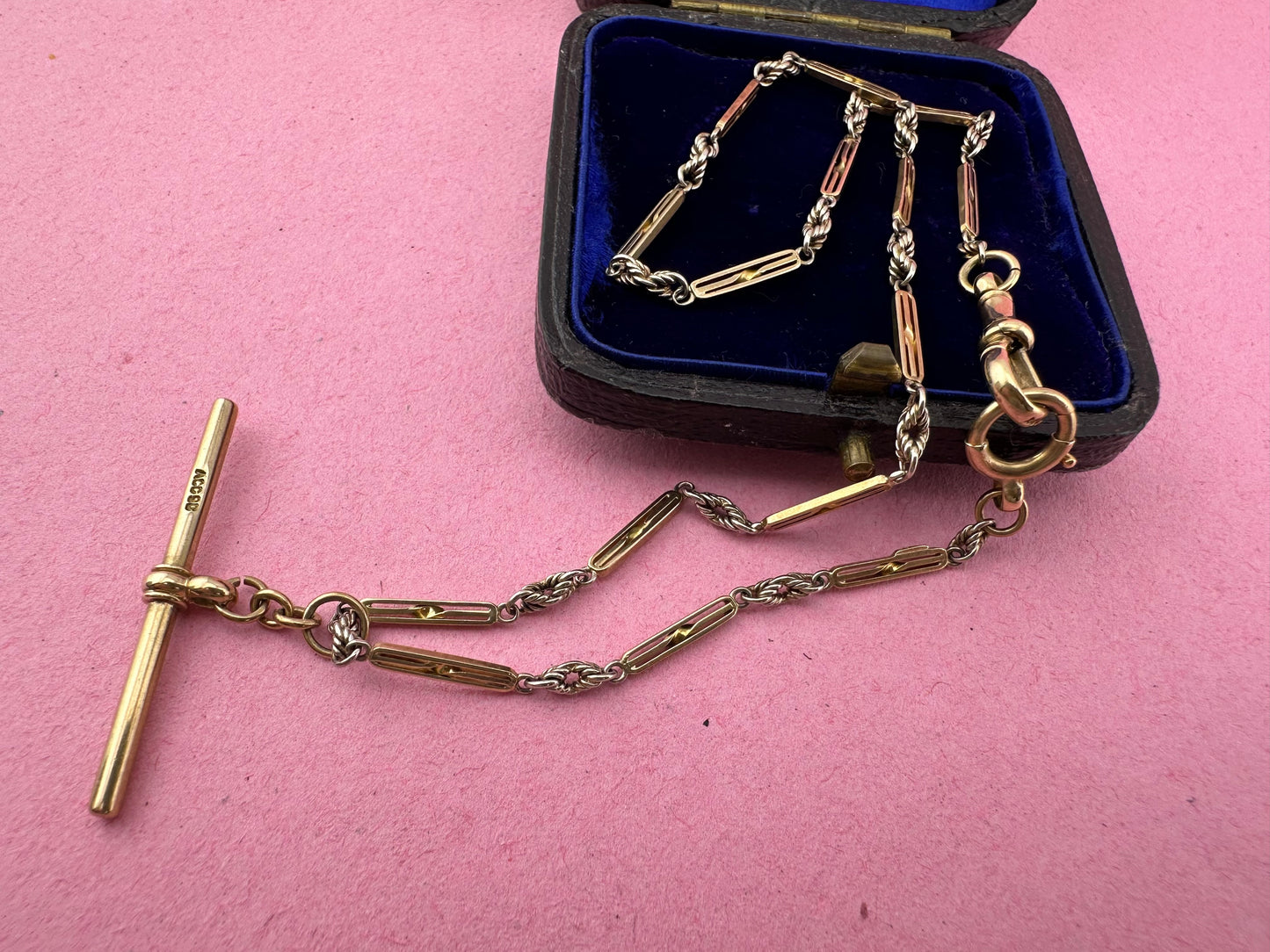 Antique 9ct bi-colour bar and lovers knot Albert chain with floating t-bar, dog clip and bolt clasp