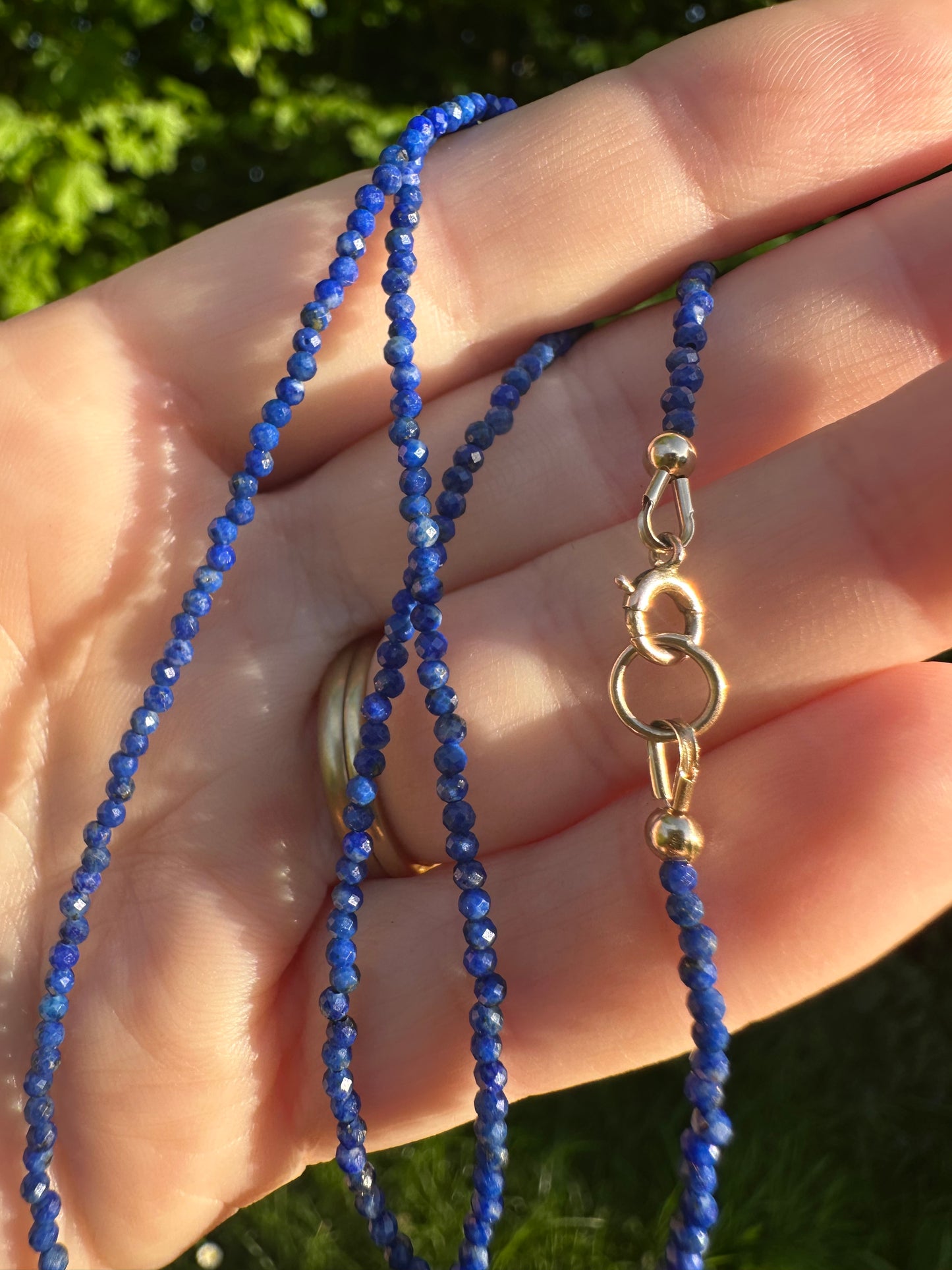 Azure- Lapis Lazuli Mini beaded necklace with asymmetrical design with 9ct antique bolt clasp.