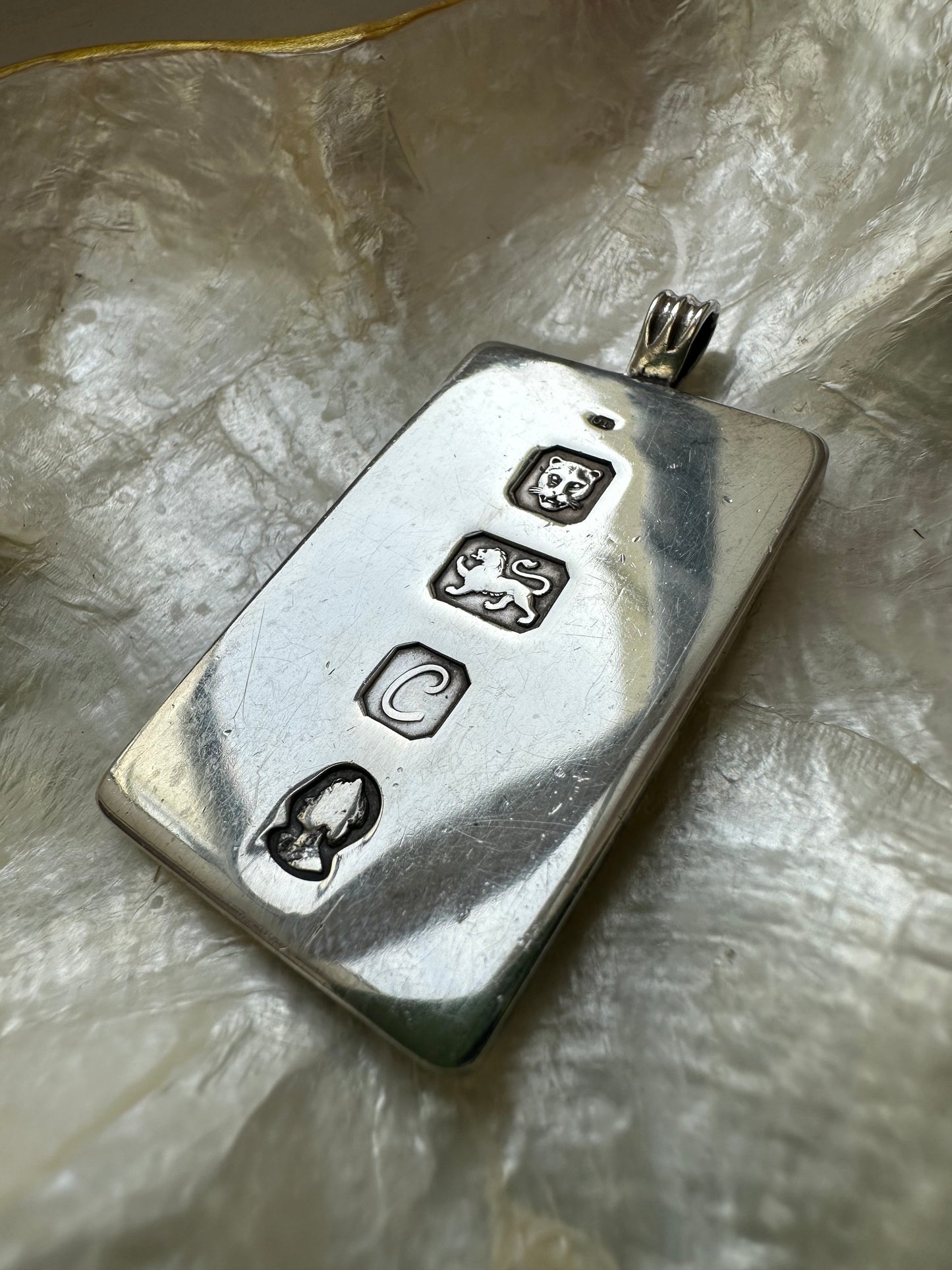 Silver ingot pendant, Silver Jubilee 1977, with brushed back