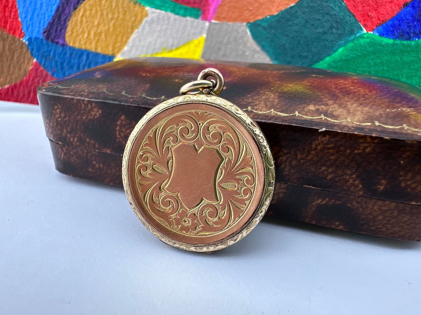 Antique 9ct gold front and back round concaved locket
