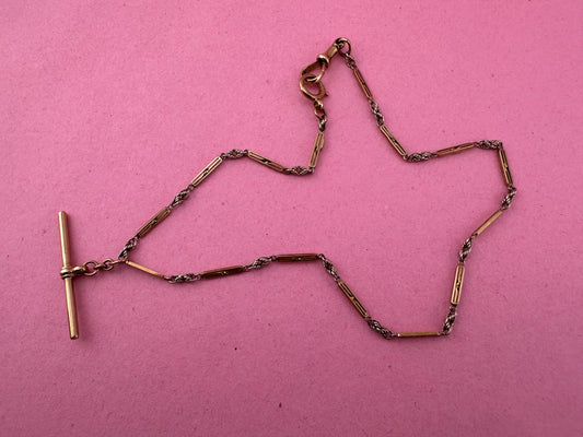 Antique 9ct bi-colour bar and lovers knot Albert chain with floating t-bar, dog clip and bolt clasp