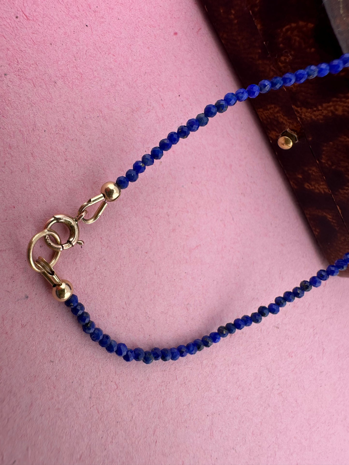 Azure- Lapis Lazuli Mini beaded necklace with asymmetrical design with 9ct antique bolt clasp.