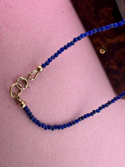 Azure- Lapis Lazuli Mini beaded necklace with asymmetrical design with 9ct antique bolt clasp.