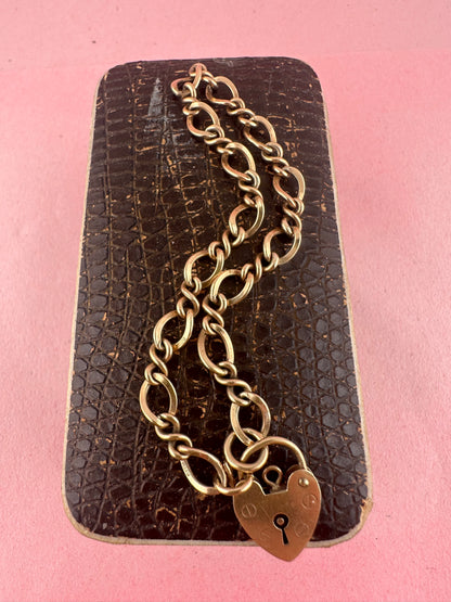 Vintage 9ct Gold Curb and Twist link bracelet with heart padlock