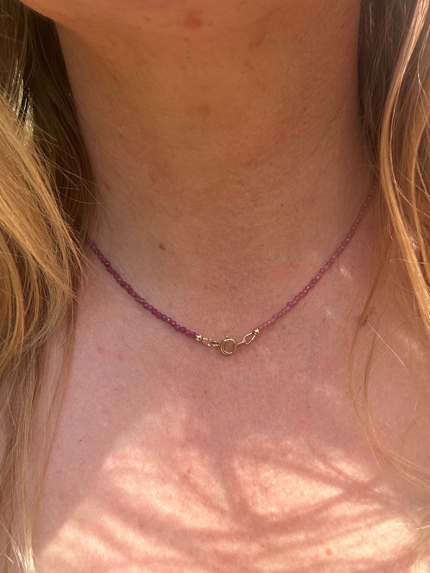 Ruby & Pink tourmaline half and half mini beads with antique 9ct gold bolt clasp and central bead.