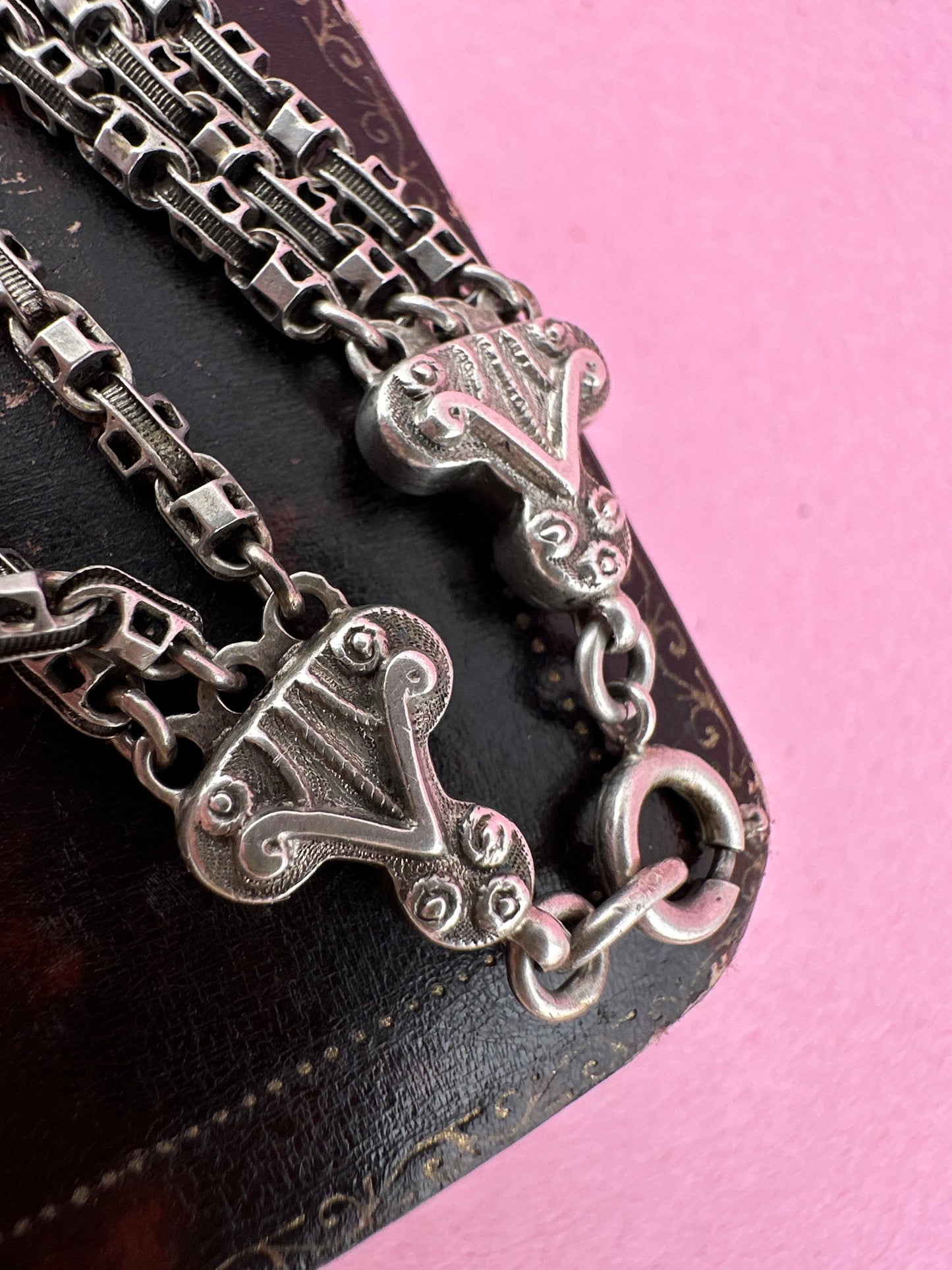 Antique Sterling Silver triple stranded fancy mariner with ornate finials bracelet.