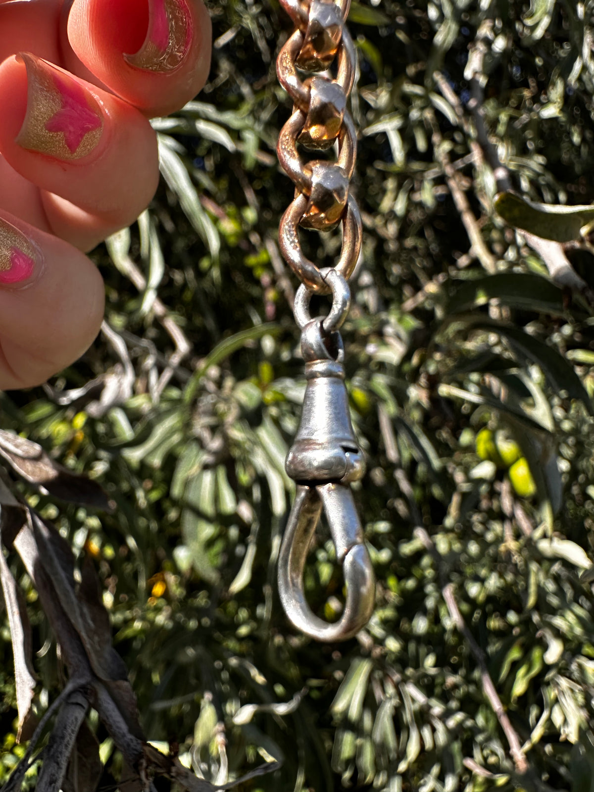 Mix metal extender. 9ct Yellow gold roller ball with sterling silver dog clip.