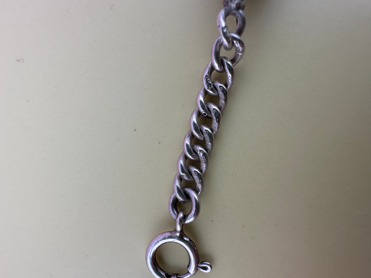 Sterling Silver Spinner Extender with spring ring clasp.