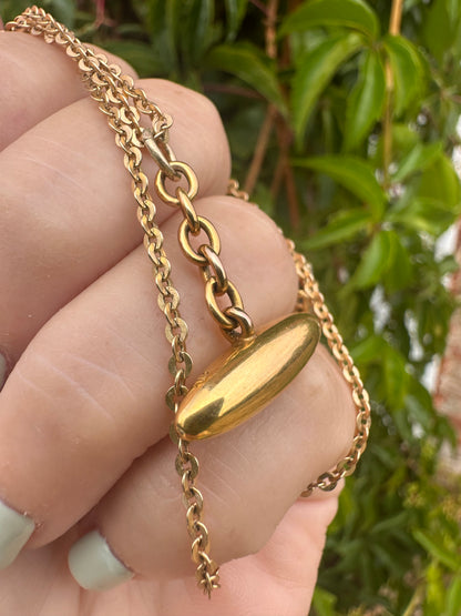 Antique 10ct gold Torpedo pendant
