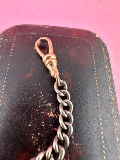 Mix metal curb extender. Sterling silver curb chain with 9ct Rose gold swivel dog clip.