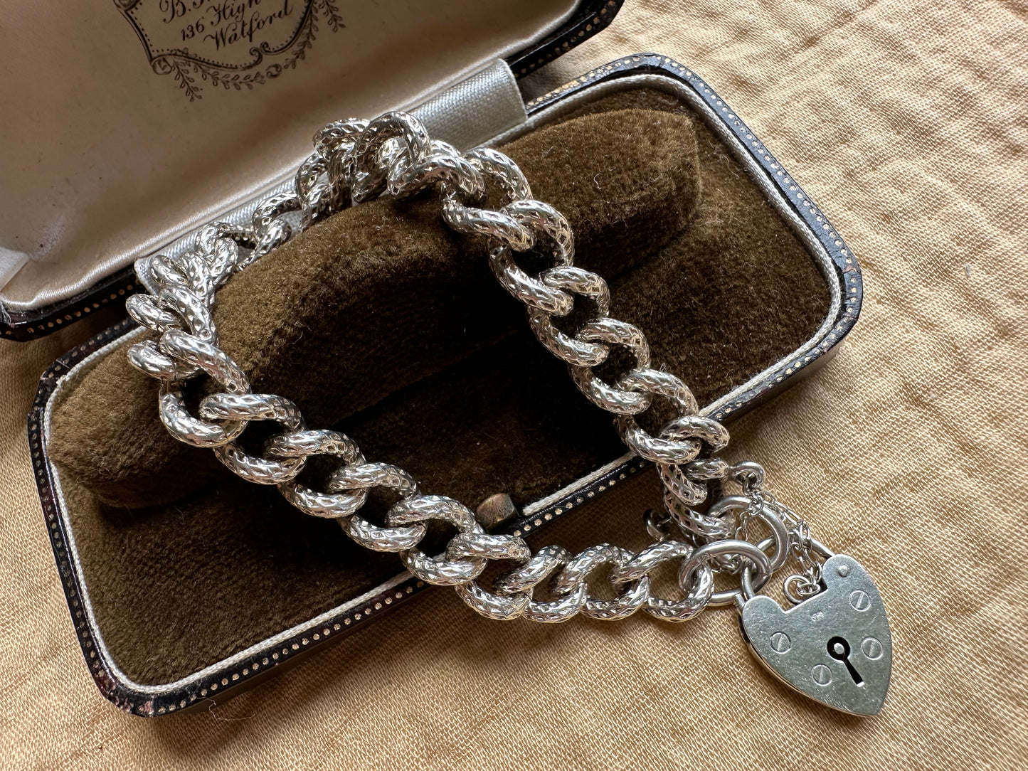 Sterling silver textured chunky curb bracelet with heart padlock