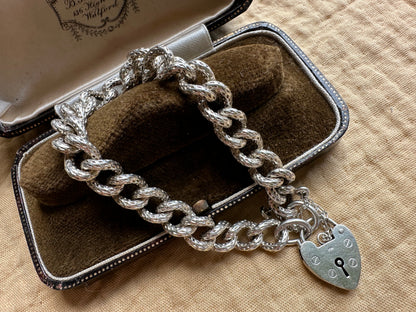 Sterling silver textured chunky curb bracelet with heart padlock