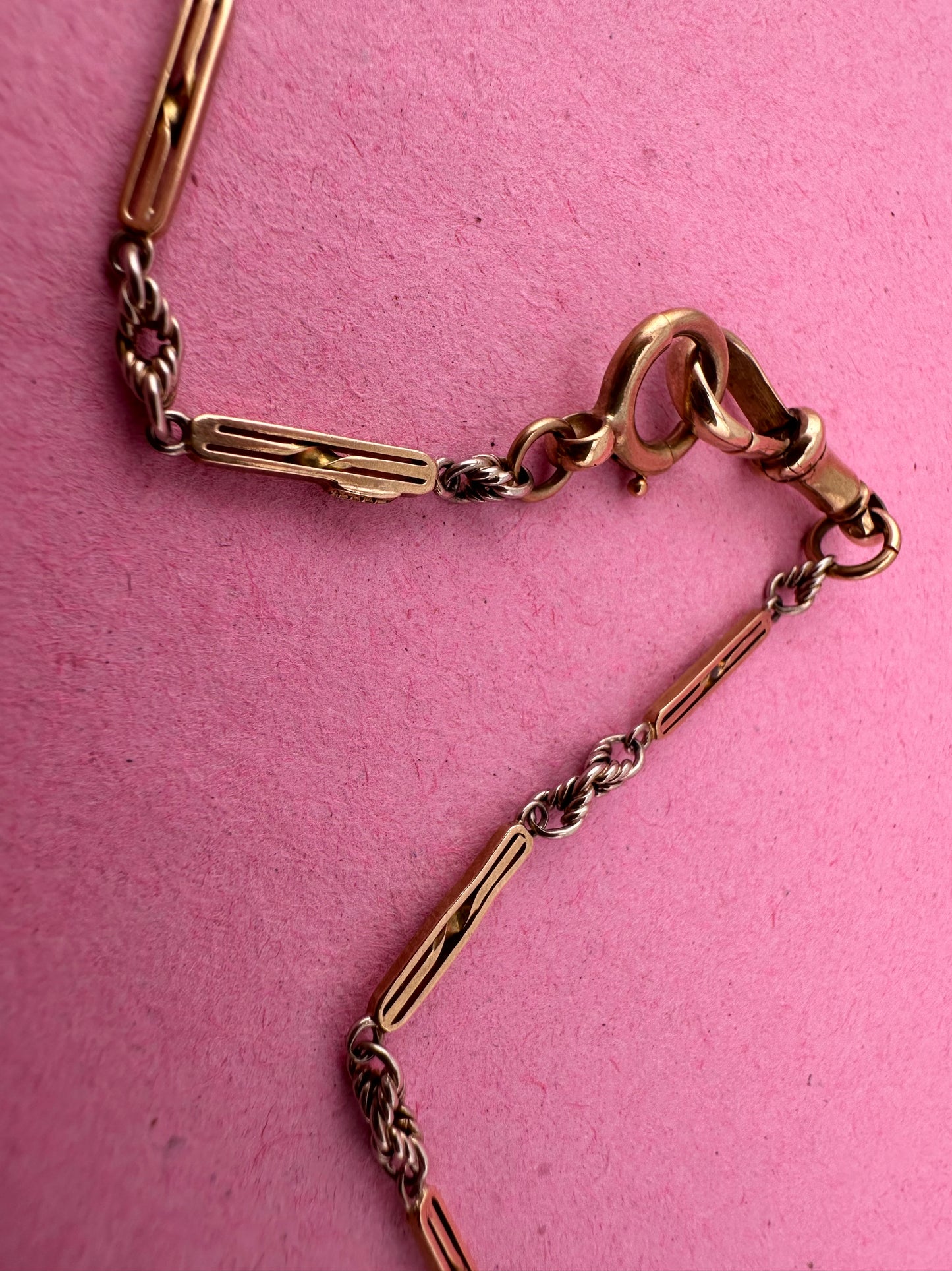 Antique 9ct bi-colour bar and lovers knot Albert chain with floating t-bar, dog clip and bolt clasp