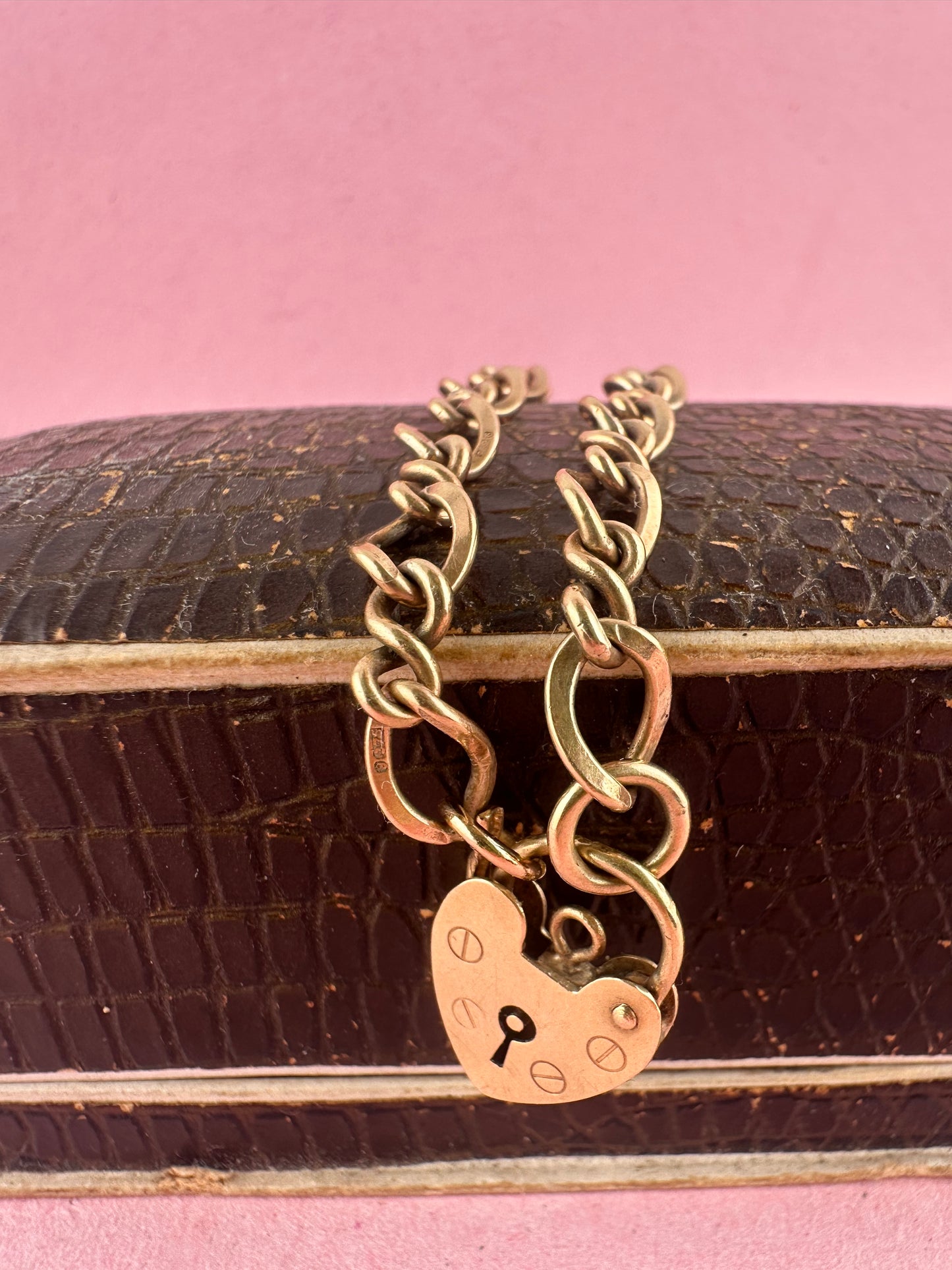 Vintage 9ct Gold Curb and Twist link bracelet with heart padlock