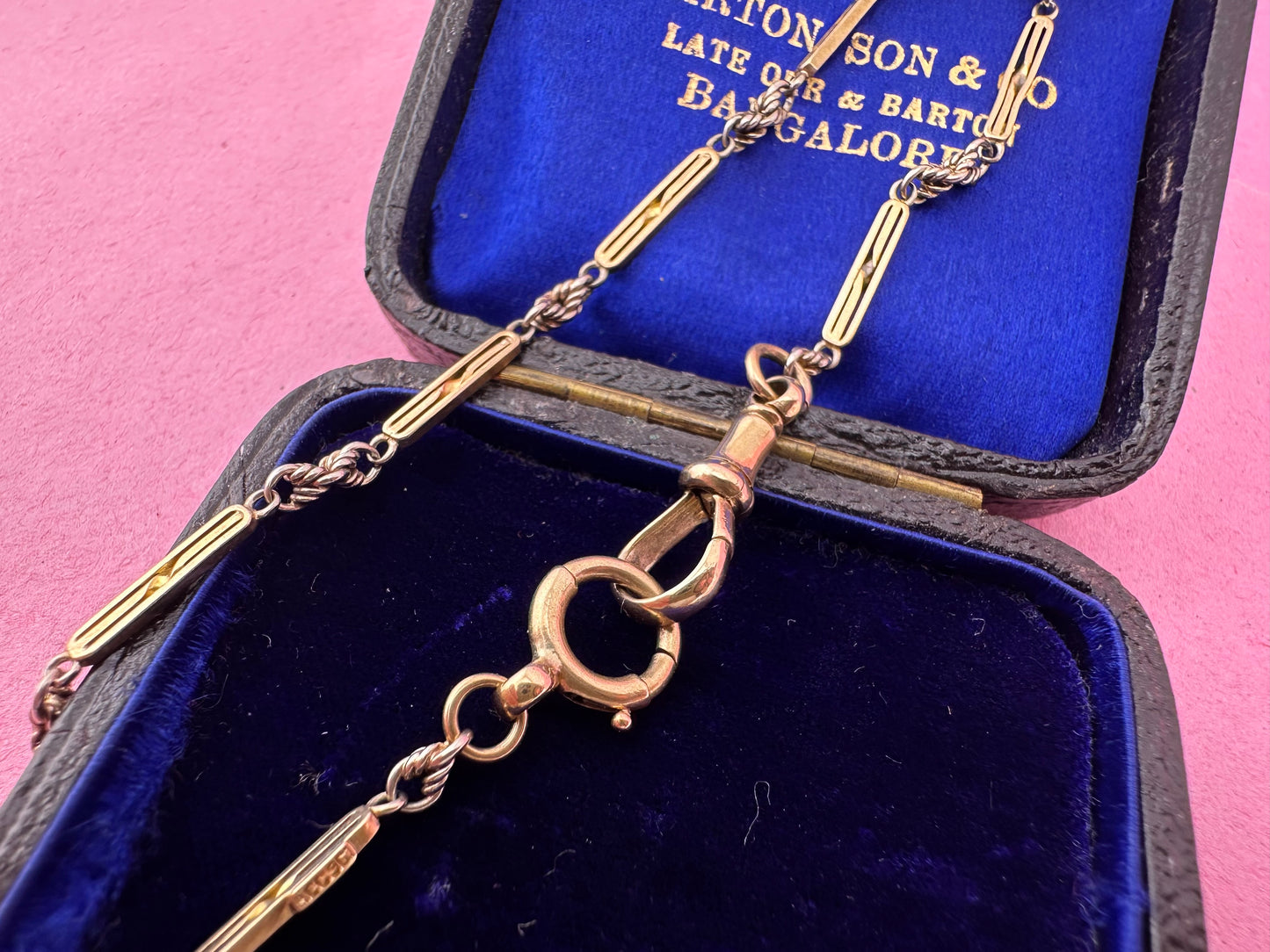 Antique 9ct bi-colour bar and lovers knot Albert chain with floating t-bar, dog clip and bolt clasp