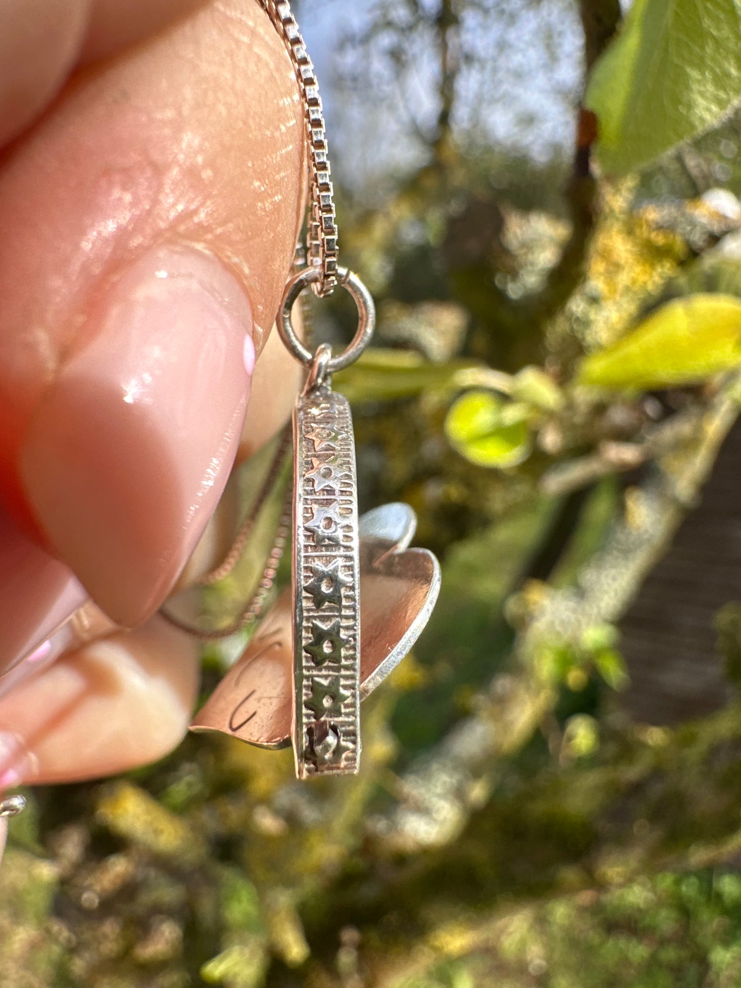 Sterling silver heart shaped ‘I Love you’ spinner