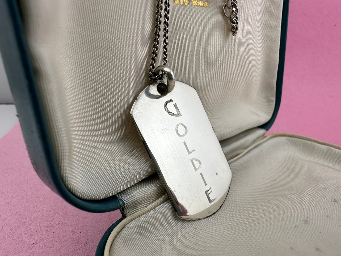 Silver Goldie Nameplate pendant on a curb chain