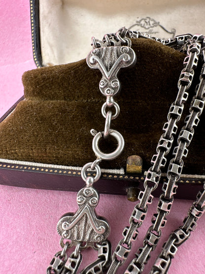 Antique Sterling Silver triple stranded fancy mariner with ornate finials bracelet.