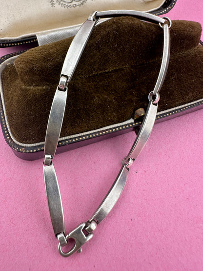 Sterling silver curved bar bracelet
