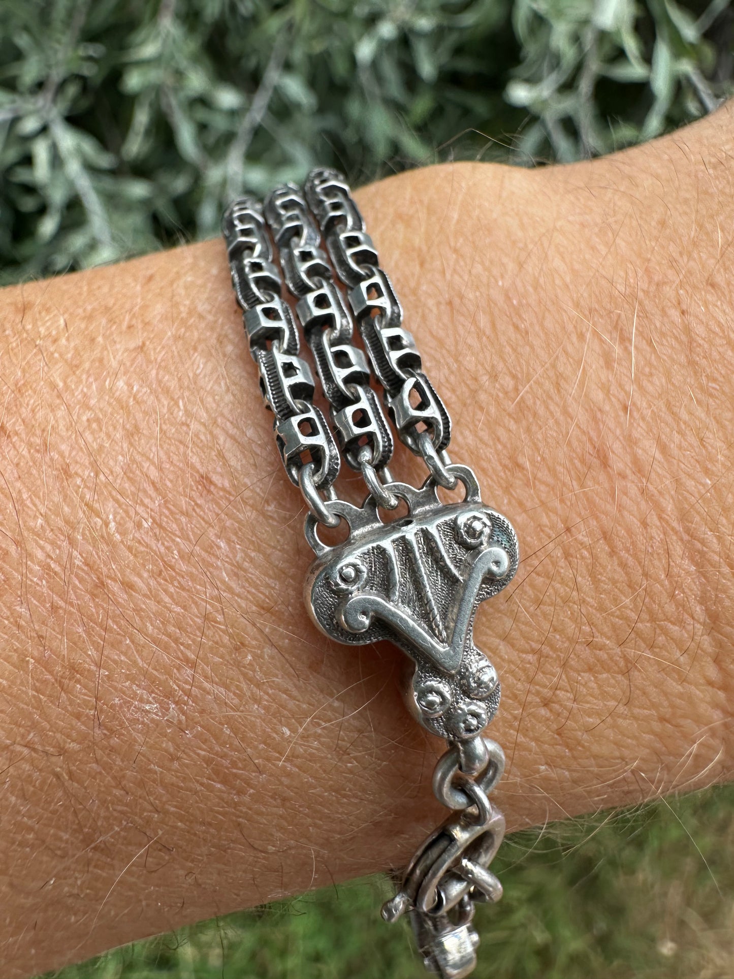 Antique Sterling Silver triple stranded fancy mariner with ornate finials bracelet.