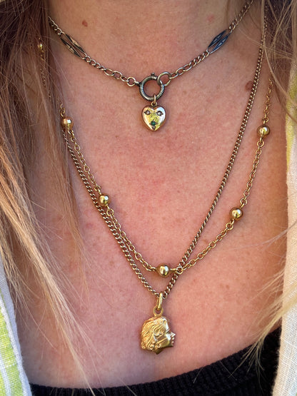 Antique 9ct rose gold heart with flush set pearls and turquoise.