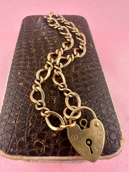 Vintage 9ct Gold Curb and Twist link bracelet with heart padlock