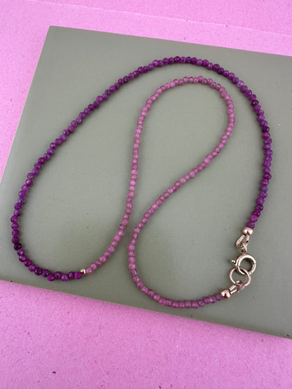 Ruby & Pink tourmaline half and half mini beads with antique 9ct gold bolt clasp and central bead.