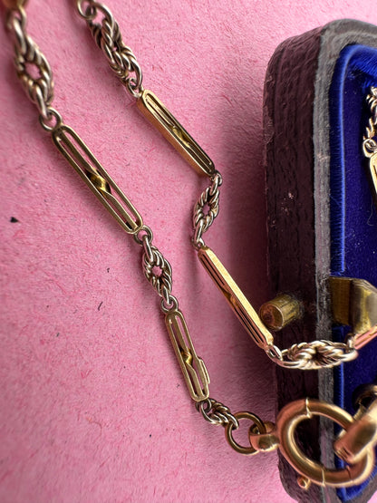 Antique 9ct bi-colour bar and lovers knot Albert chain with floating t-bar, dog clip and bolt clasp