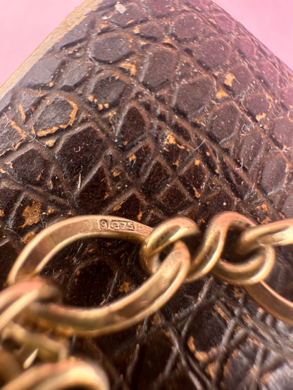 Vintage 9ct Gold Curb and Twist link bracelet with heart padlock