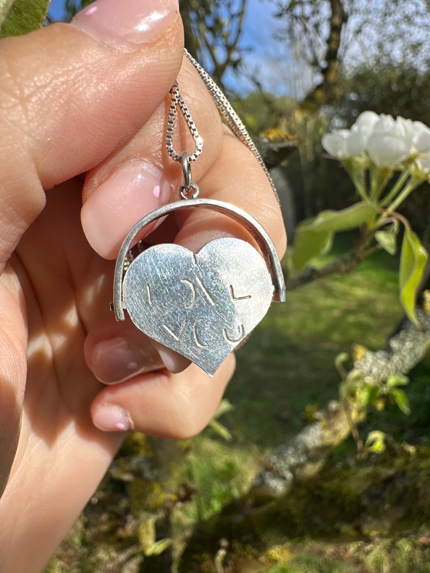 Sterling silver heart shaped ‘I Love you’ spinner