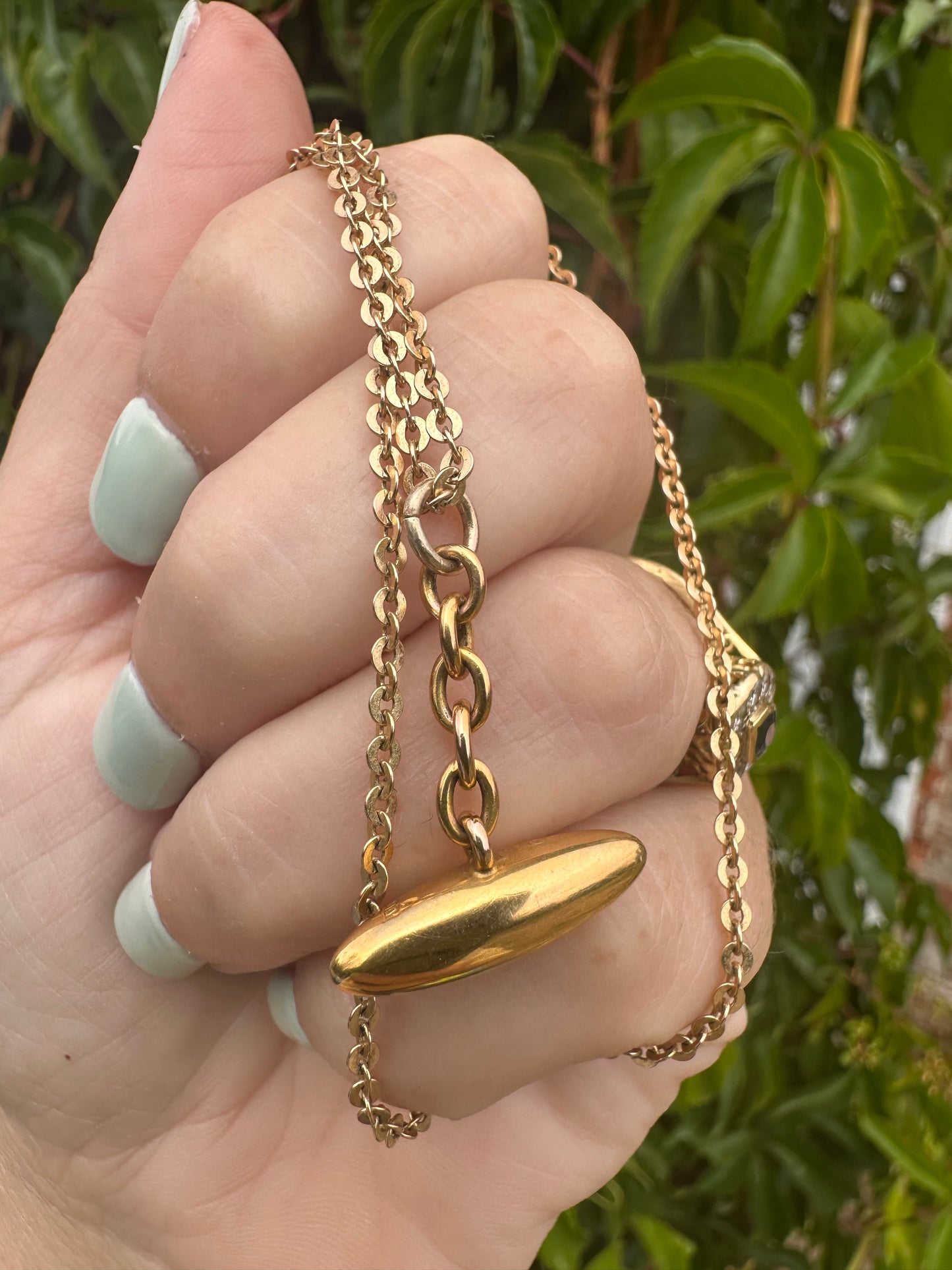 Antique 10ct gold Torpedo pendant