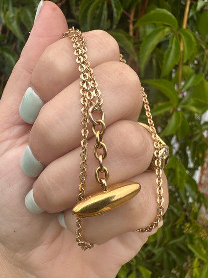 Antique 10ct gold Torpedo pendant