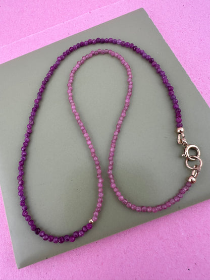 Ruby & Pink tourmaline half and half mini beads with antique 9ct gold bolt clasp and central bead.