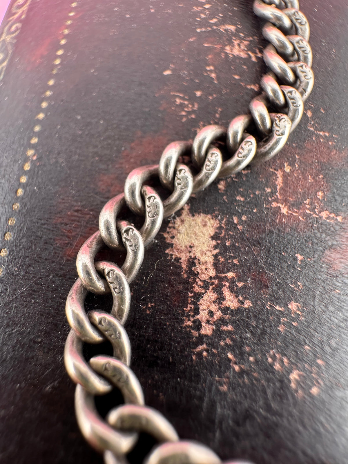Mix metal curb extender. Sterling silver curb chain with 9ct Rose gold swivel dog clip.