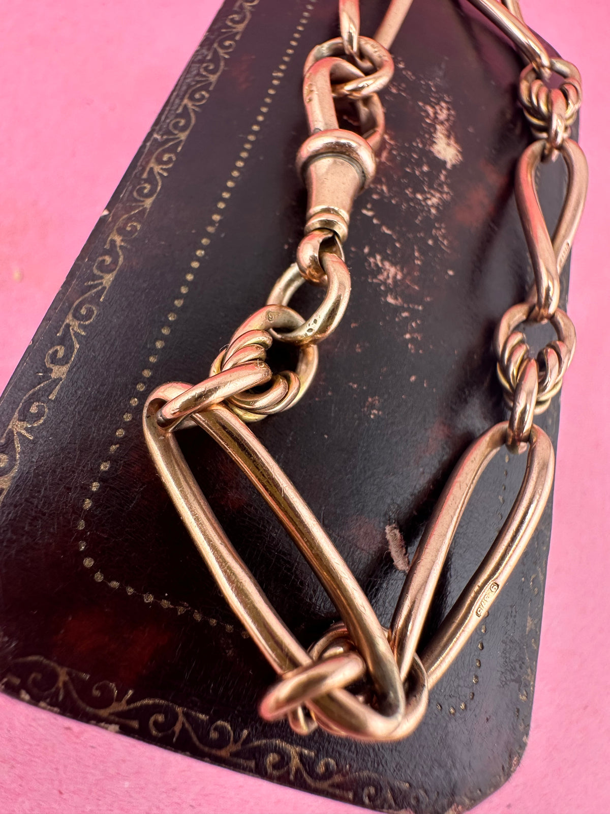 Antique 9ct Rose gold twist trombone & lovers knot bracelet with dog clip.