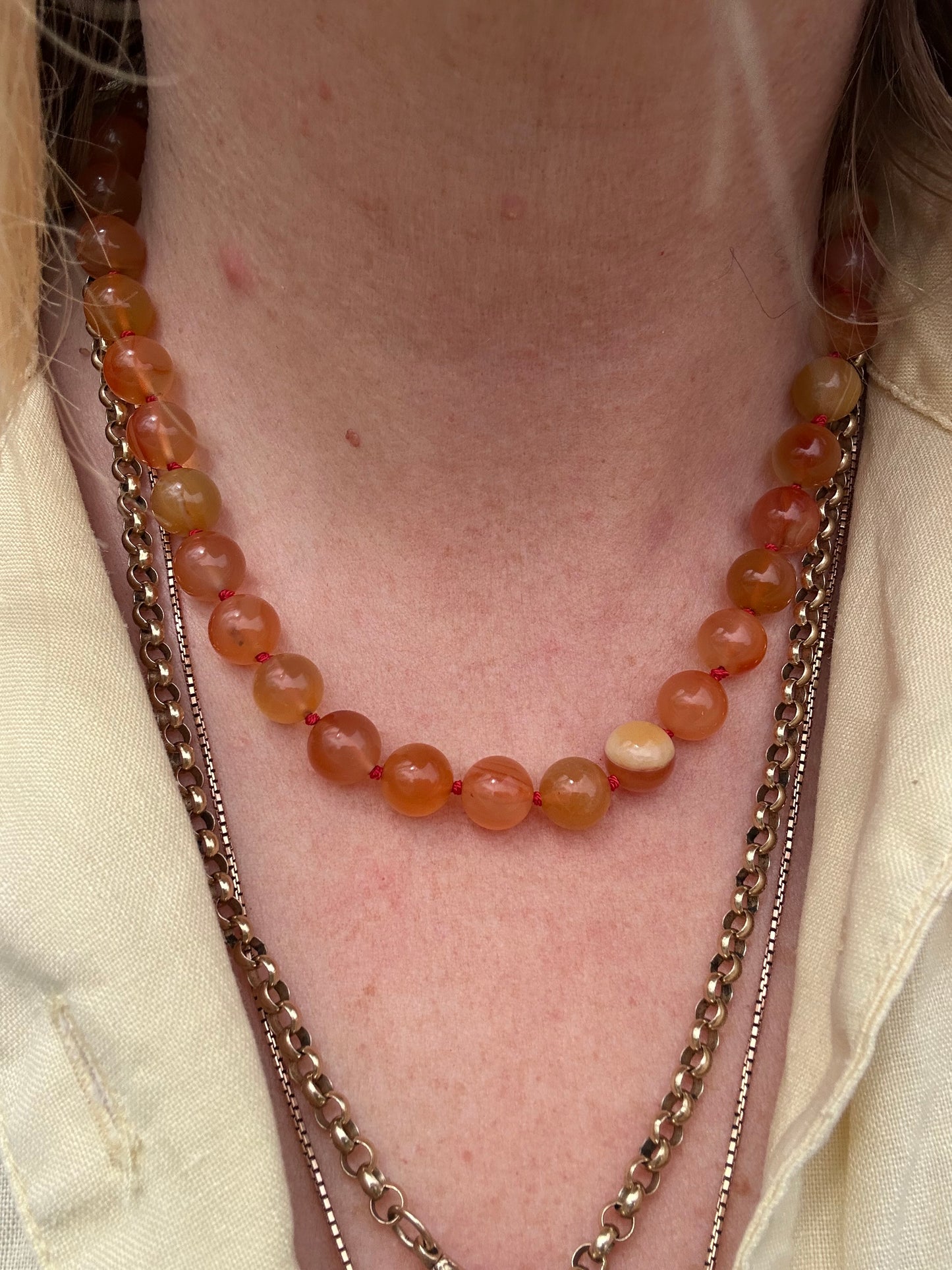 Re-imagined Orange Agate beads with Antique Dog clip