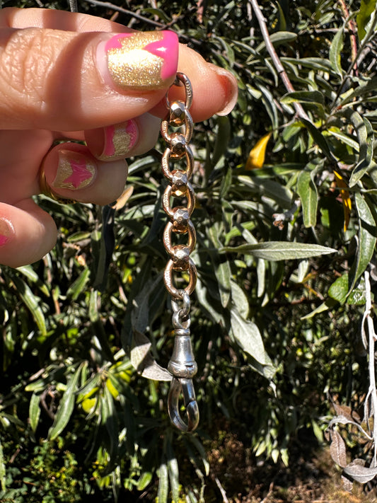 Mix metal extender. 9ct Yellow gold roller ball with sterling silver dog clip.