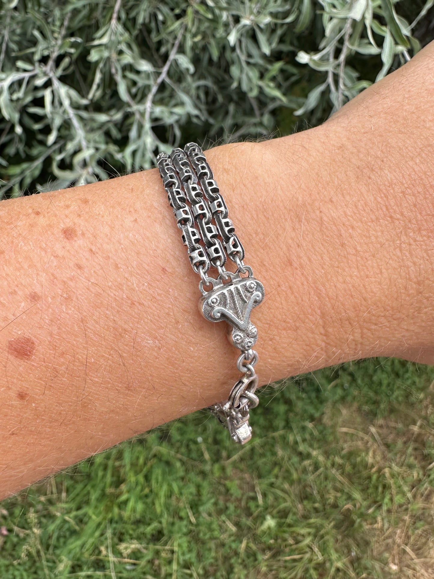 Antique Sterling Silver triple stranded fancy mariner with ornate finials bracelet.