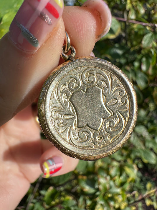 Antique 9ct gold front and back round concaved locket