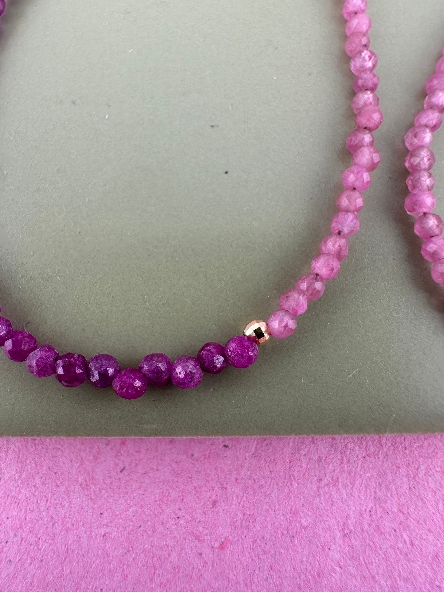 Ruby & Pink tourmaline half and half mini beads with antique 9ct gold bolt clasp and central bead.