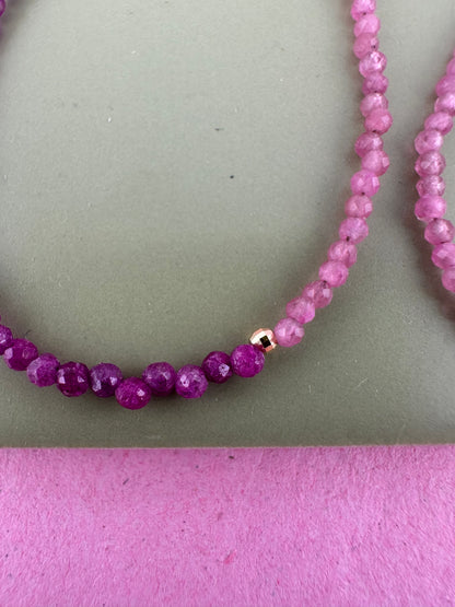 Ruby & Pink tourmaline half and half mini beads with antique 9ct gold bolt clasp and central bead.